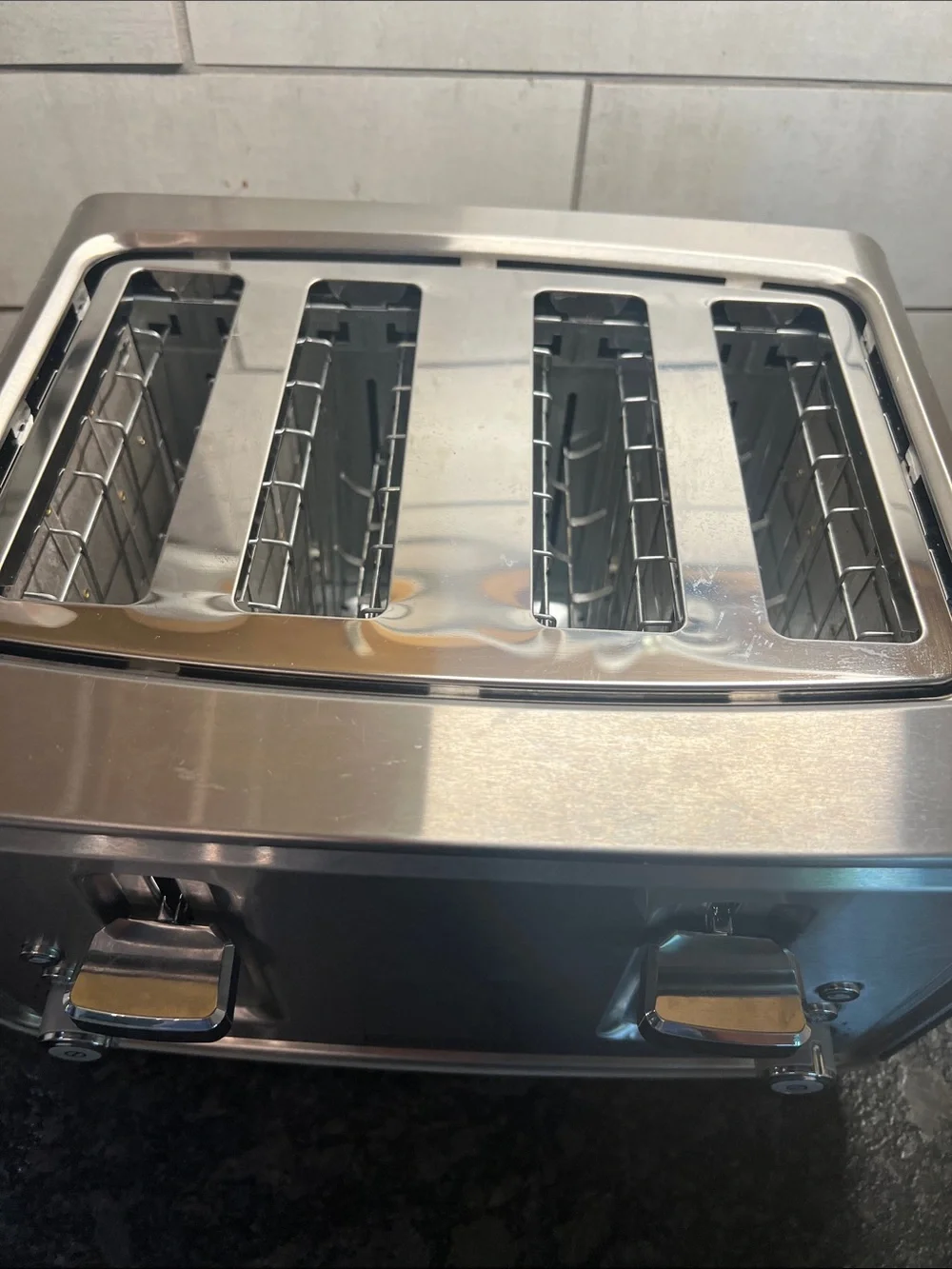 Wide 4 Slot Black and Decker Stainless toaster. Like new.